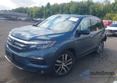 2017 Honda Pilot Elite z USA, uszkodzony, nr VIN 5FNYF6H04HB042662